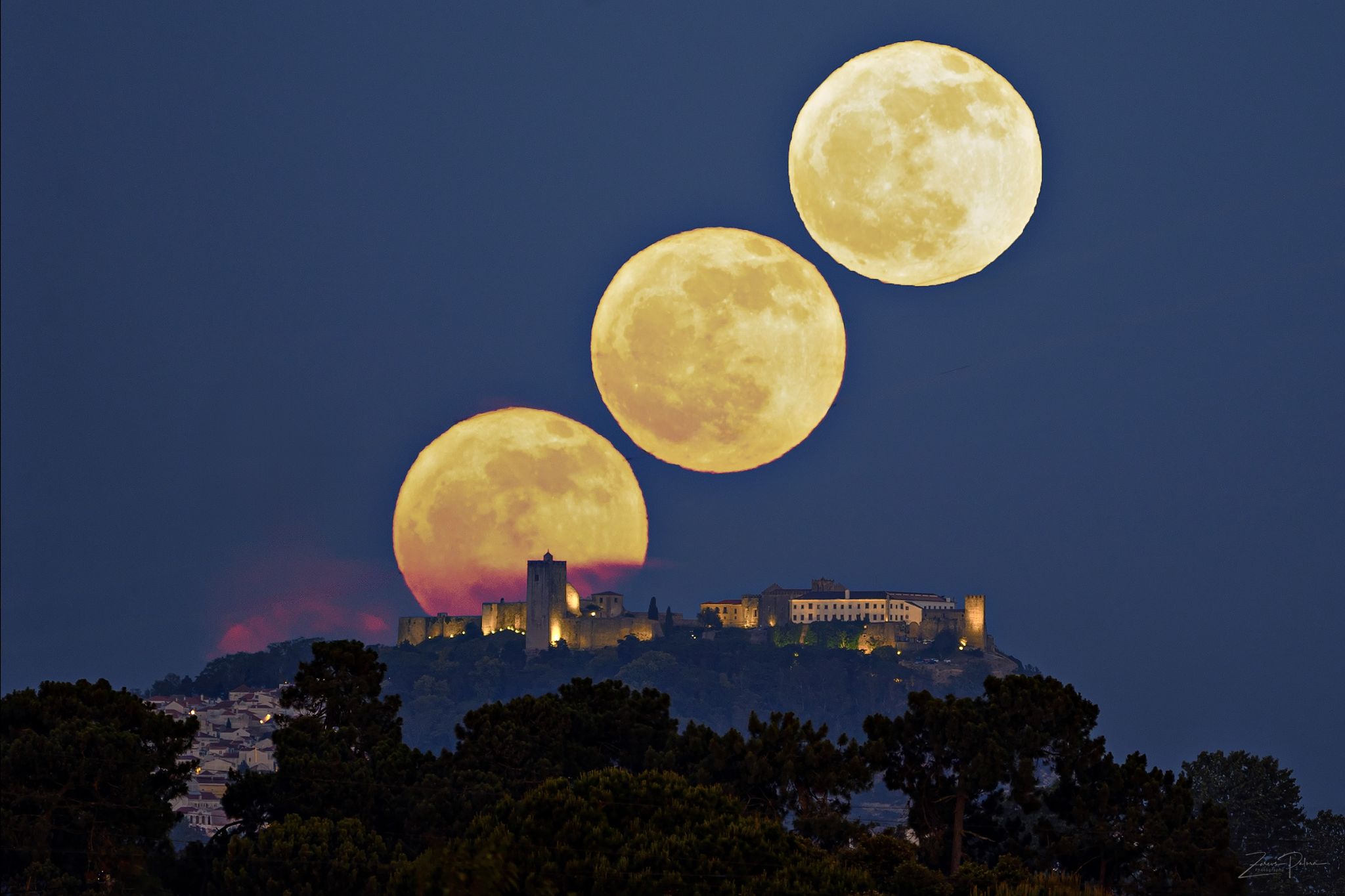 Community photo entitled Flower Moon raising over Palmela Castle by JOSE PALMA on 05/23/2024 at Palmela , Portugal