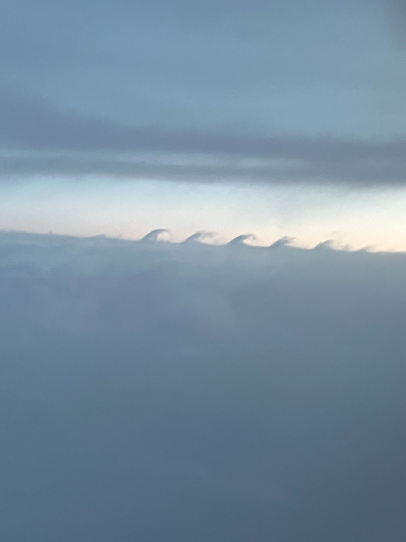 Community photo entitled Cloud waves above Eugene Oregon 2024 by Michael Moffitt on 05/04/2024 at From airplane window, outside of Eugene Oregon