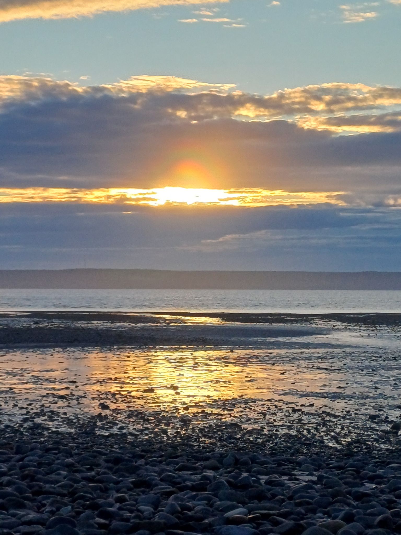 Community photo entitled Rainbow Sunset at Bourneuf Wharf, NS by Sarah England on 06/10/2024 at Bourneuf Wharf beach, Grosses Coques, Nova Scotia, Canada