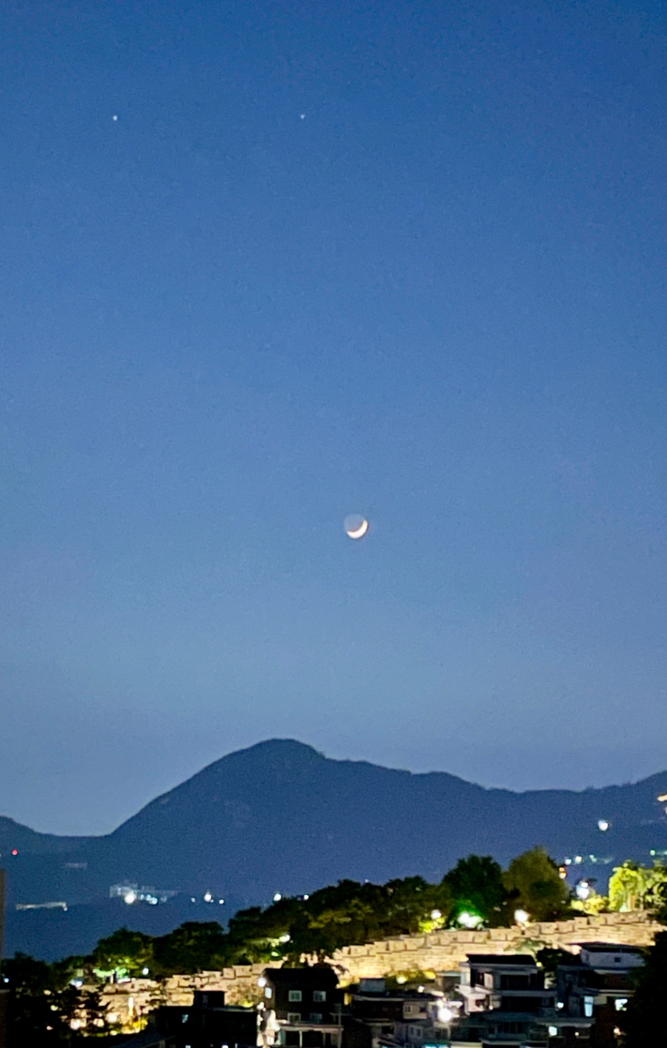 Community photo entitled Crescent moon, Gemini, and the Seoul fortress wall by Todd Hull on 06/08/2024 at Seoul, South Korea