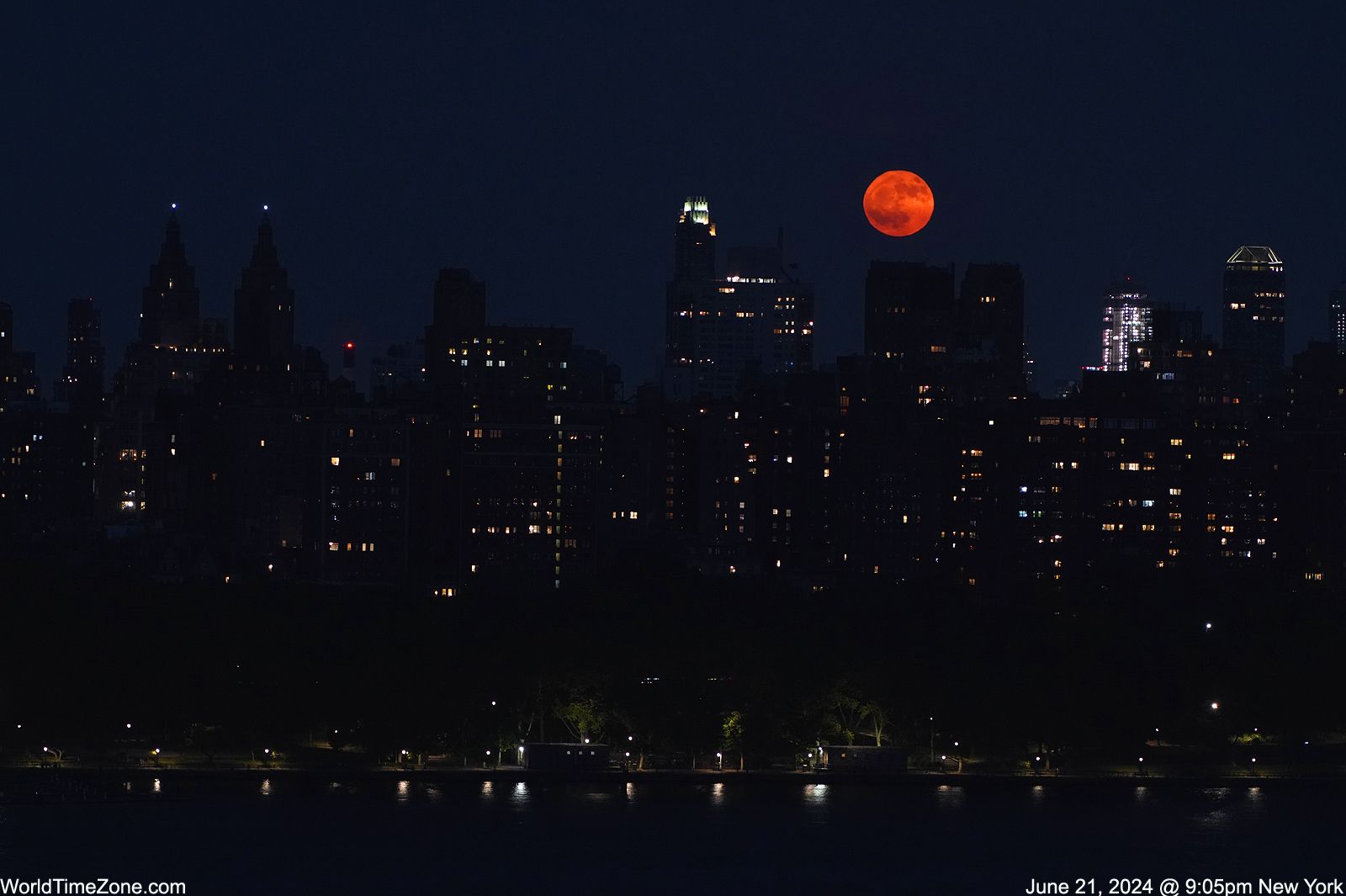 Community photo entitled Full Strawberry Moon rises New York city. by Alexander Krivenyshev on 06/21/2024 at Manhattan, New York