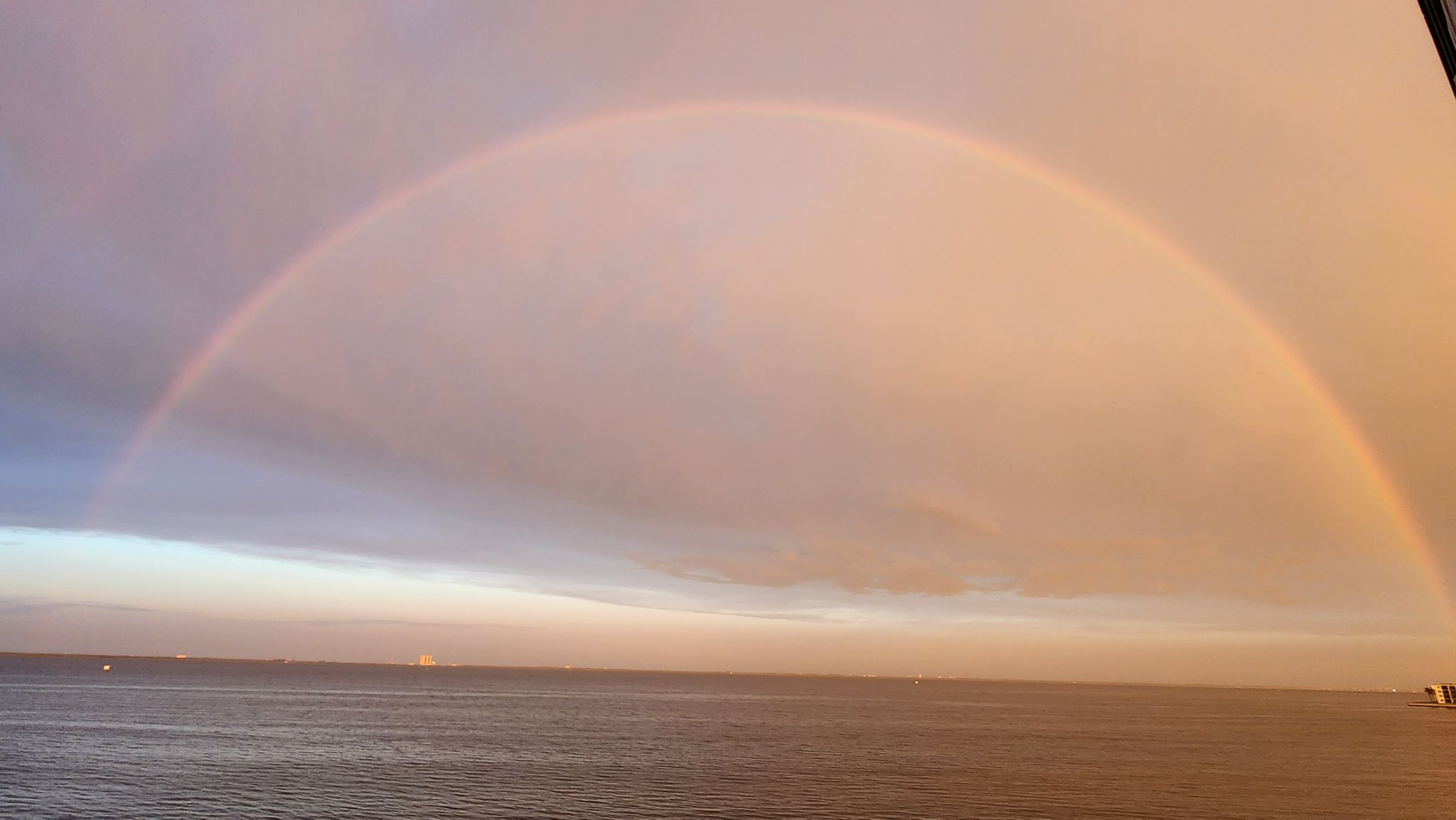 Community photo entitled Sunset rainbow over AVB (Assembly Vehicle Building) in Kenedy Space Center(KSCP. by Thuan Clavet on 07/16/2024 at Titusville, Florida, USA