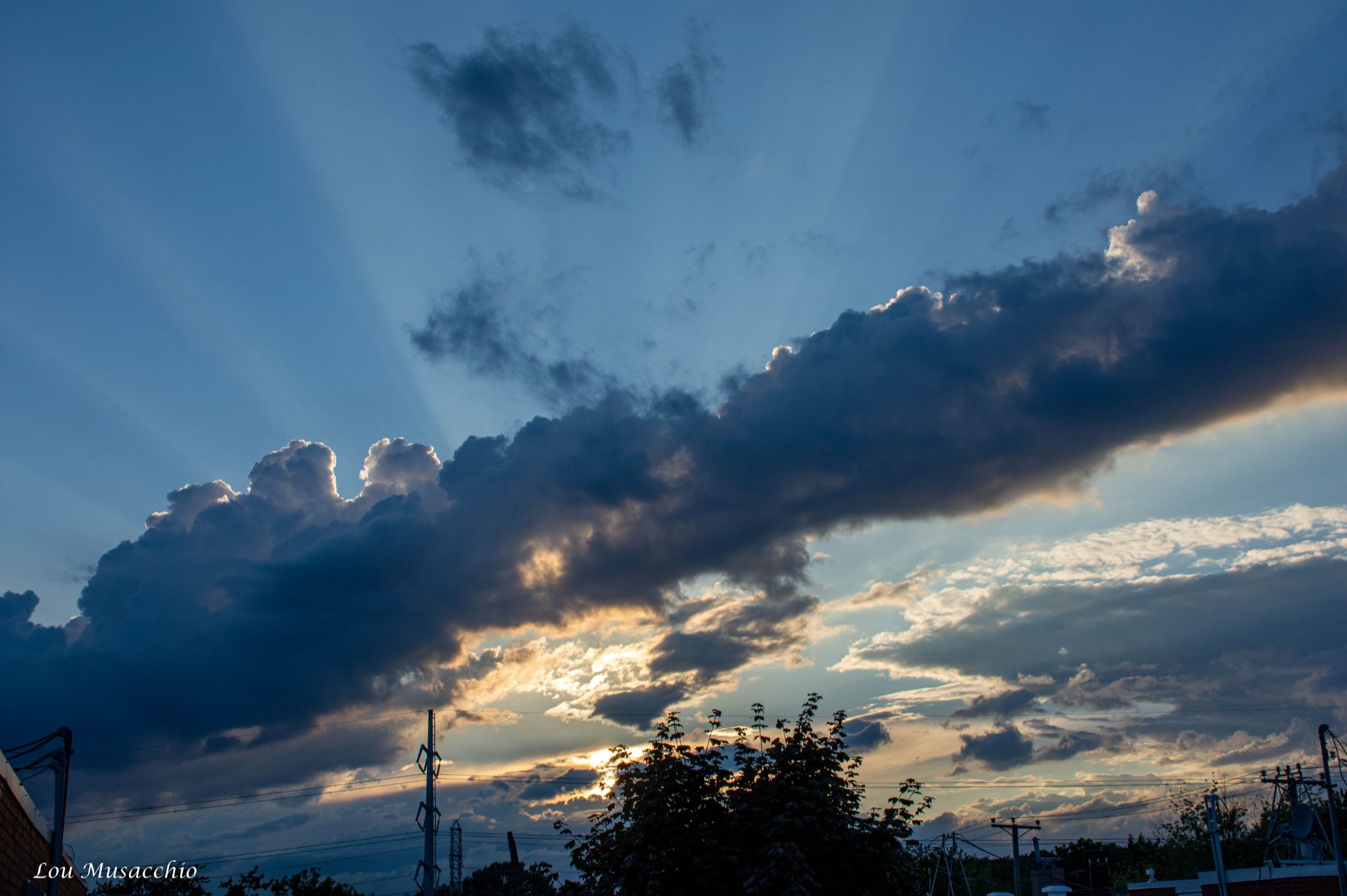 Community photo entitled Crepuscular Sunset by Lou Musacchio on 07/06/2024 at Montreal, Quebec, Canada