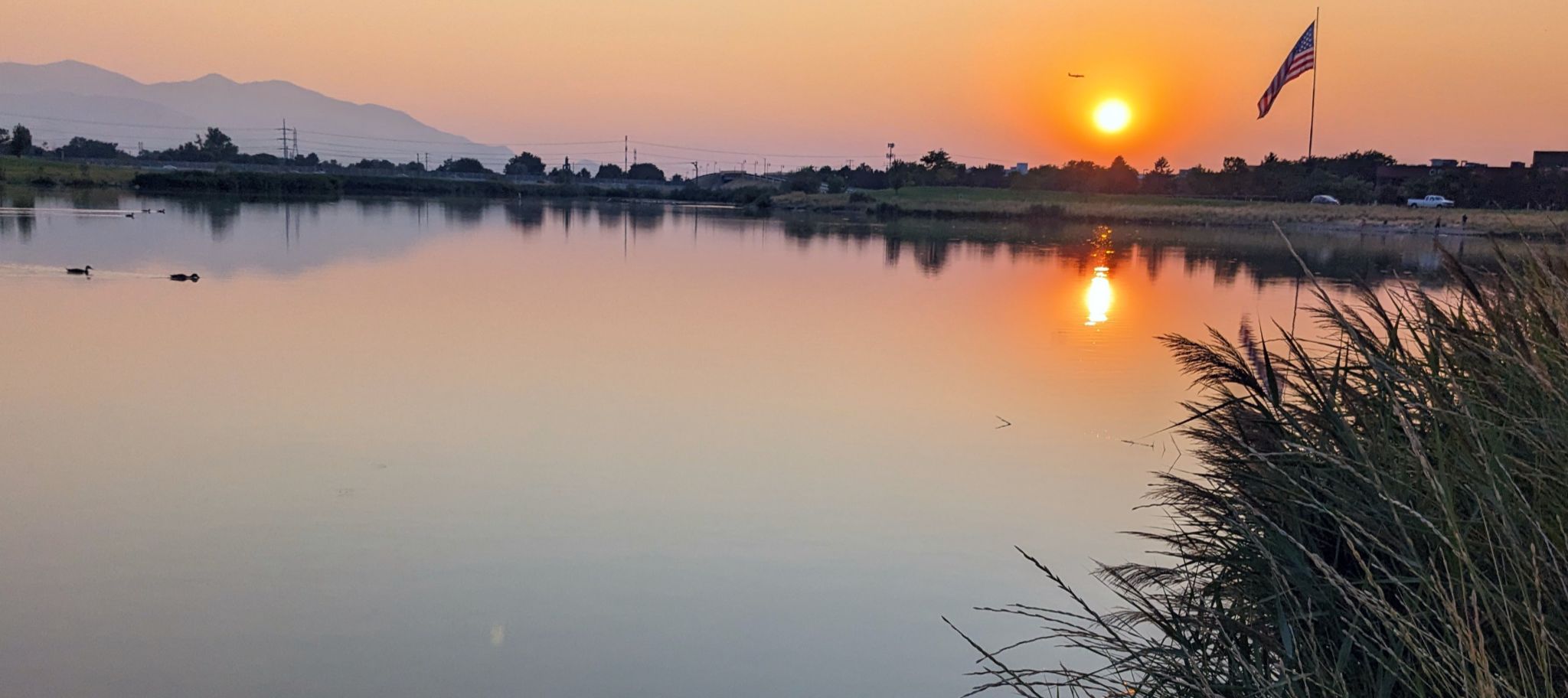 Community photo entitled Smoky Red Sunset over Decker Lake by Steve Price on 07/30/2024 at Decker Lake, West Valley, Utah