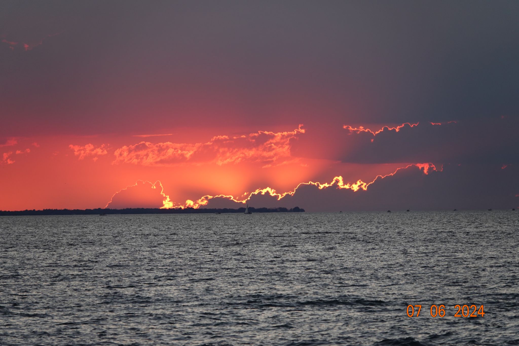 Community photo entitled Braddock Point on fire! by Tom Jones on 07/06/2024 at Irondequoit Bay Outlet, NY State