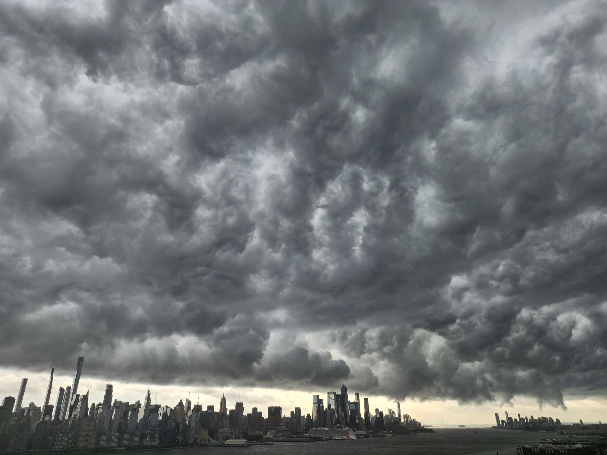 Community photo entitled Mammatus clouds above New York by Alexander Krivenyshev on 08/04/2024 at Guttenberg, New Jersey