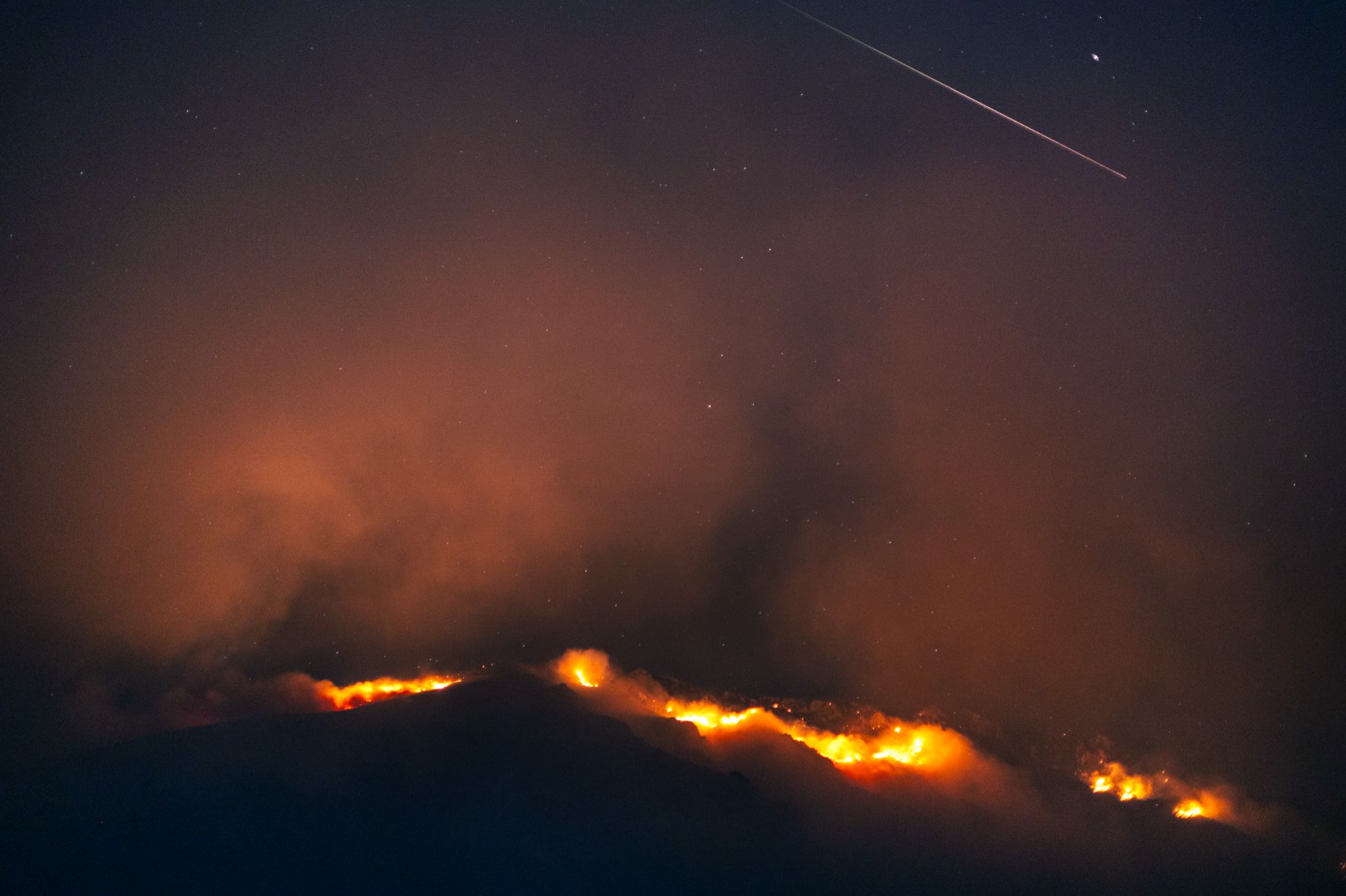 Community photo entitled Photo of Wildfire at National Park Galicica and Perseid Meteor by Riste Spiroski on 08/15/2024 at Ohrid, Macedonia