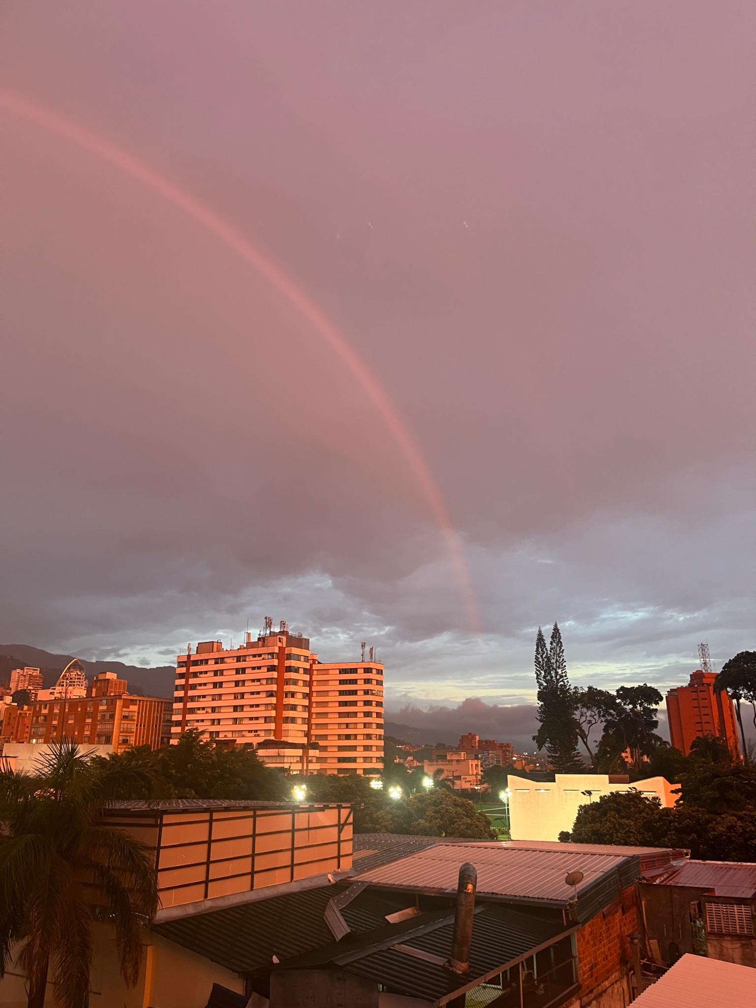 Community photo entitled Red rainbow over Bucaramanga by Ramiro Fernando Trillos on 08/13/2024 at Bucaramanga