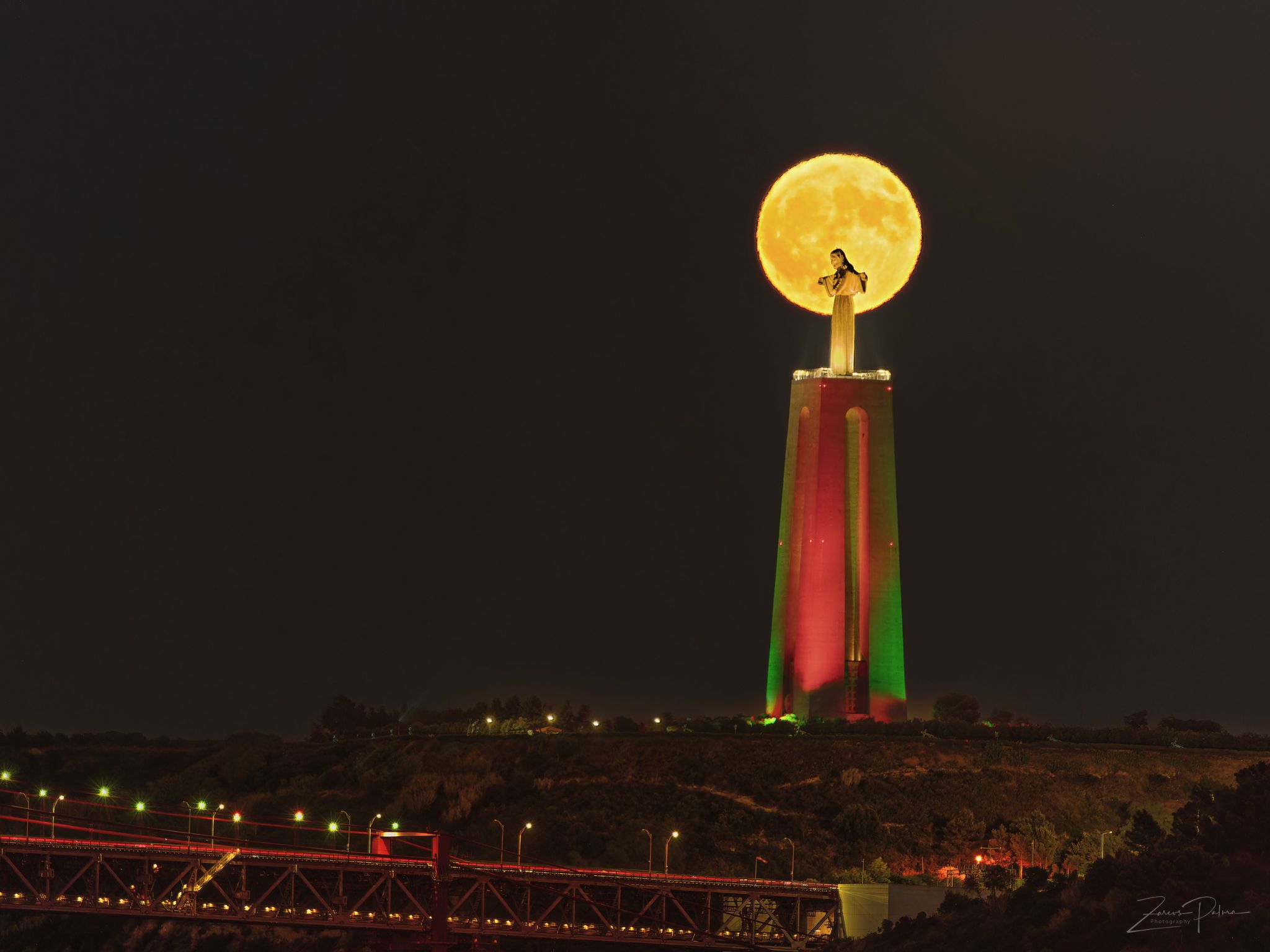 Community photo entitled Super Blue Moon embraces Christ the King by jose palma on 08/19/2024 at Belem , Lisboa , Portugal