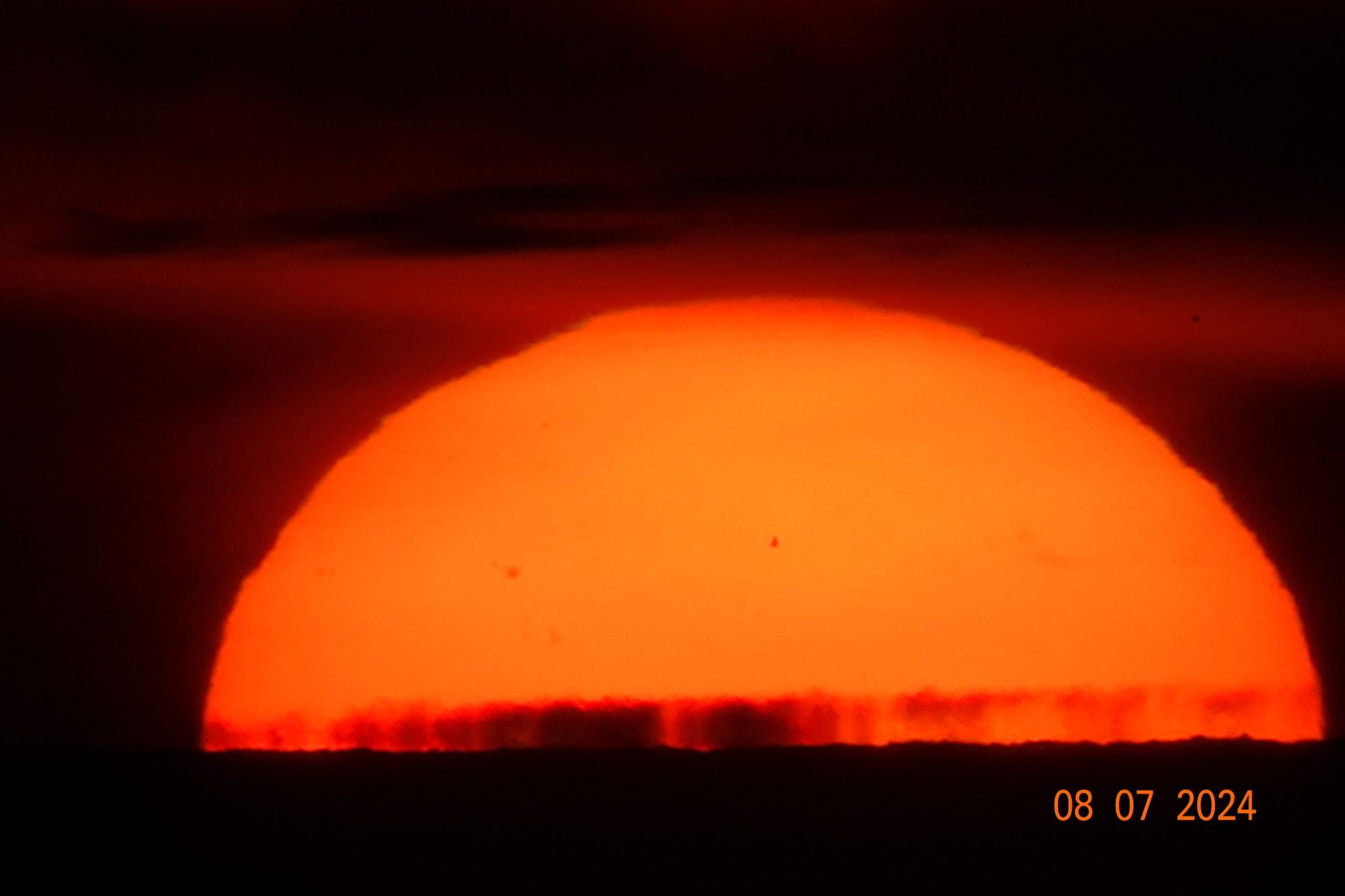 Community photo entitled fata morgana + sunspots by Tom Jones on 08/09/2024 at Webster Beach Park, Webster, NY