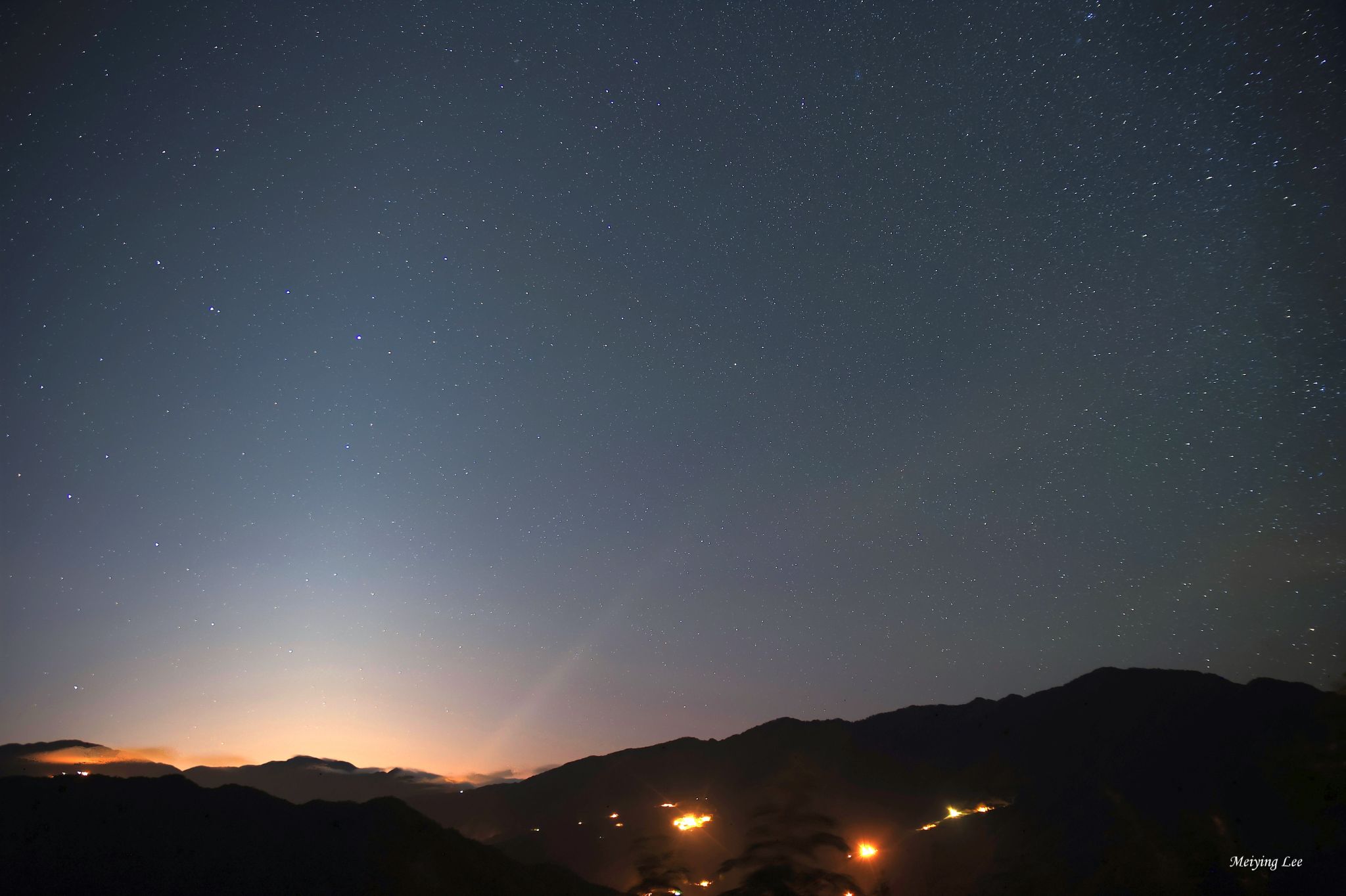 Community photo entitled Comet Tail of C/2023 A3 and Zodiacal Light by Meiying Lee on 10/07/2024 at Hsinchu, Taiwan