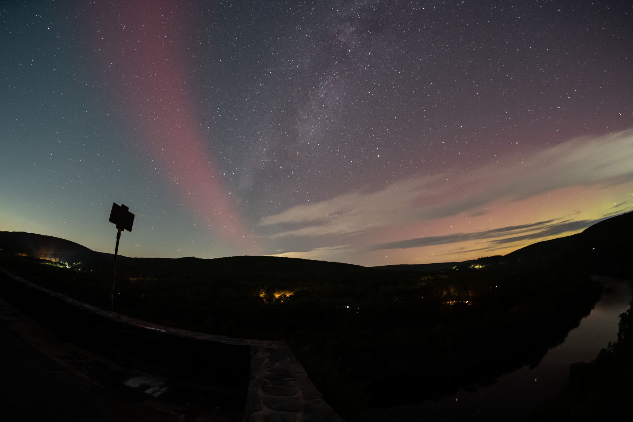 Community photo entitled SAR arc, aurora and the Milky Way over historic marker on the Delaware river. by George Preoteasa on 10/08/2024 at Hawks Nest, NY, USA