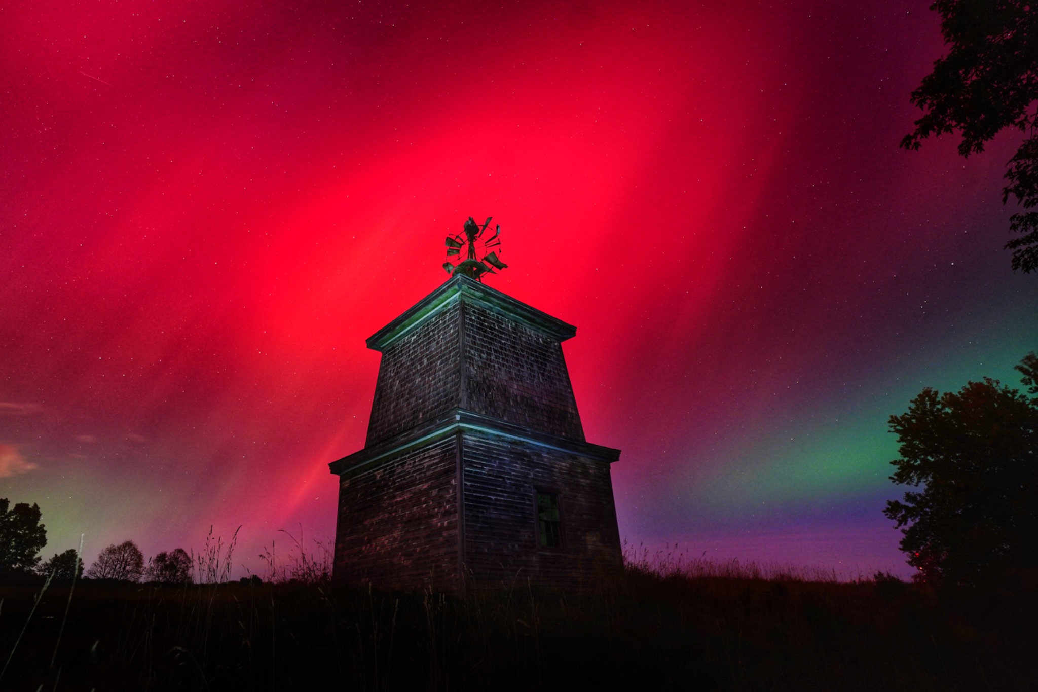 Community photo entitled Windmill Aurora by Jamie Grant on 10/10/2024 at Dayton Maine