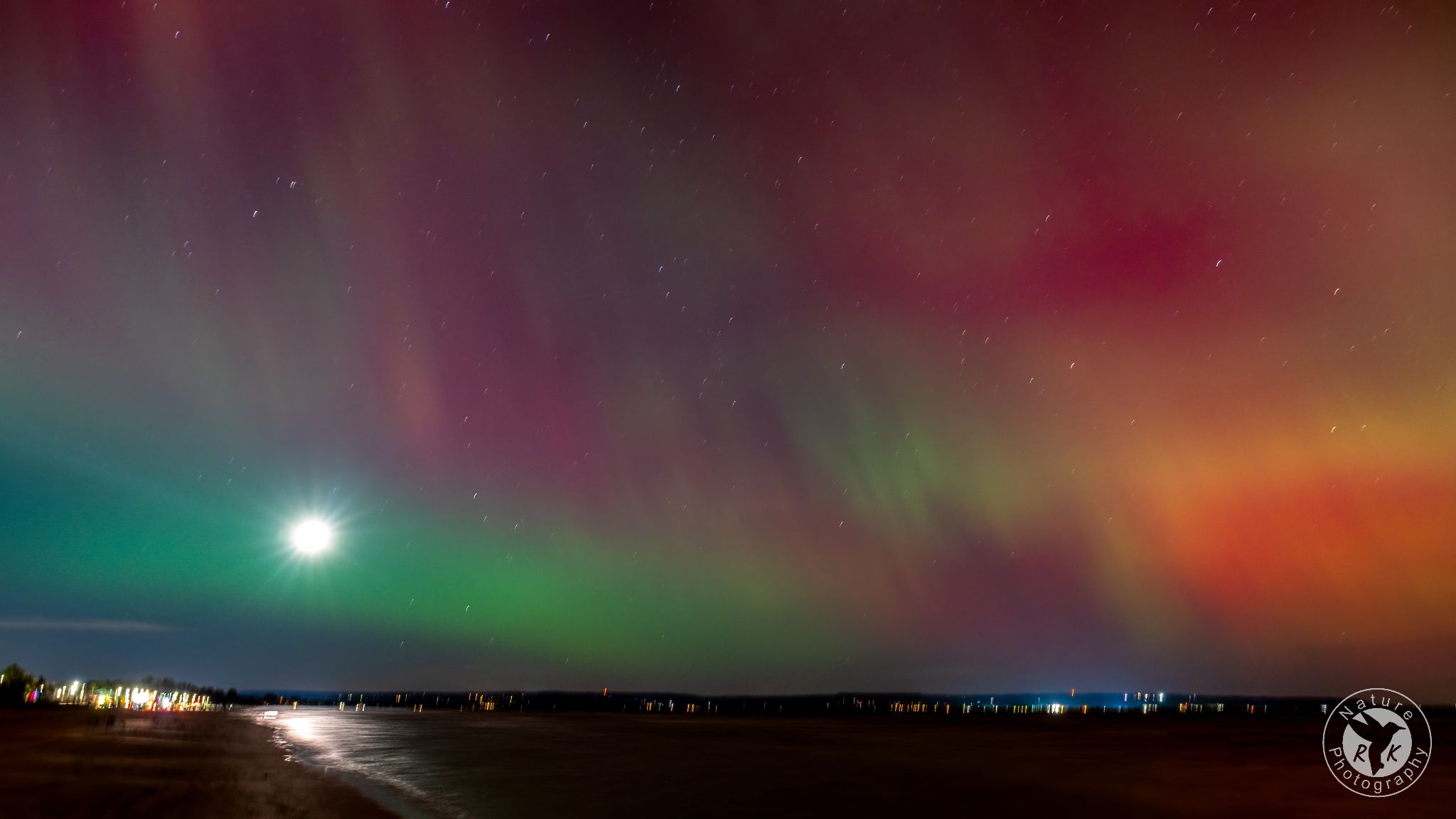 Community photo entitled Aurora Moonset by Richard Kitchen on 10/10/2024 at Wasaga Beach, Ontario, Canada