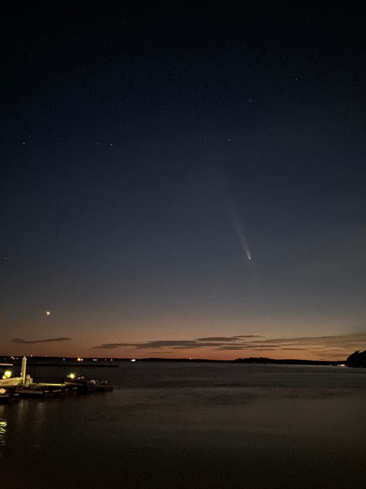 Community photo entitled Comet Tsuchinson-ATLAS and planet Venus (lower left) above the James River, Williamsburg, Virginia, on October 14, 2024 at 7:35 pm. by Joel Levine on 10/14/2024 at Williamsburg, Virginia, USA