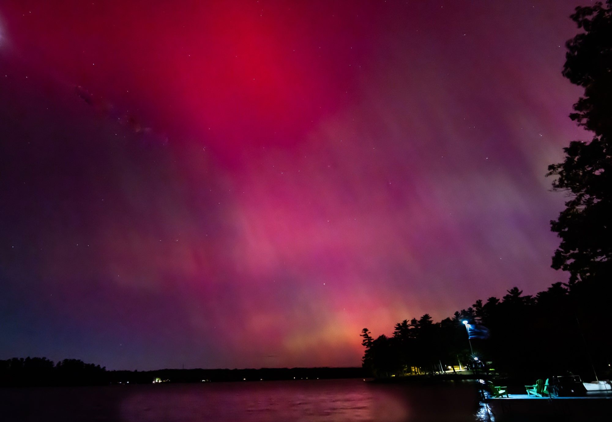 Community photo entitled Auroras Over Three Mile Pond by Maria Cruz on 10/10/2024 at South China, Maine