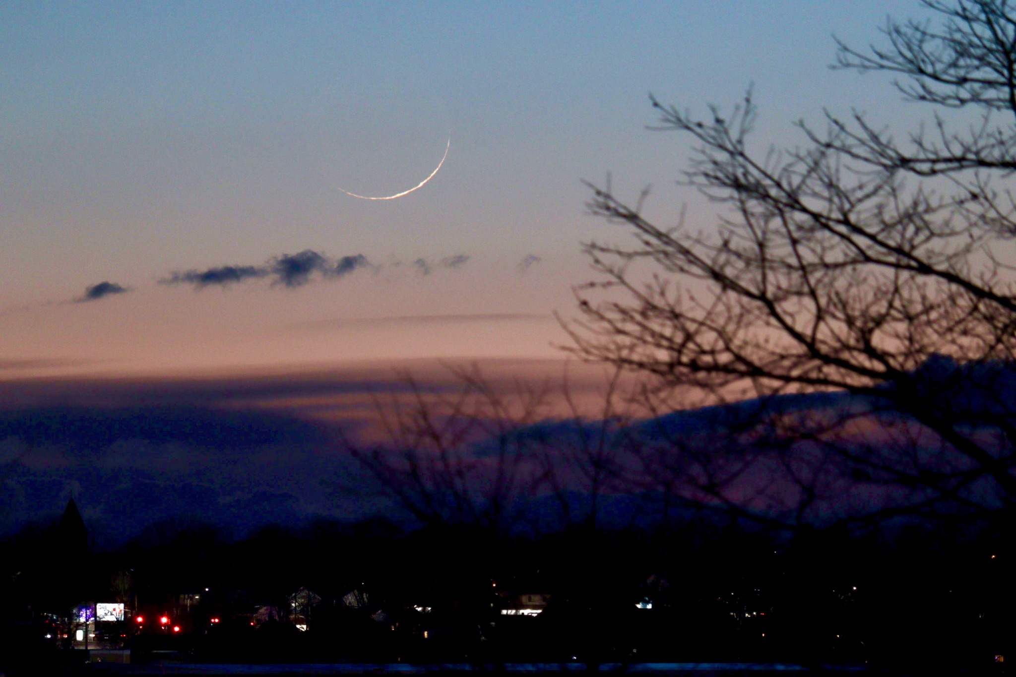 Community photo entitled Young crescent 22 hours after New Moon by David Chapman on 02/28/2025 at Dartmouth, Nova Scotia, Canada
