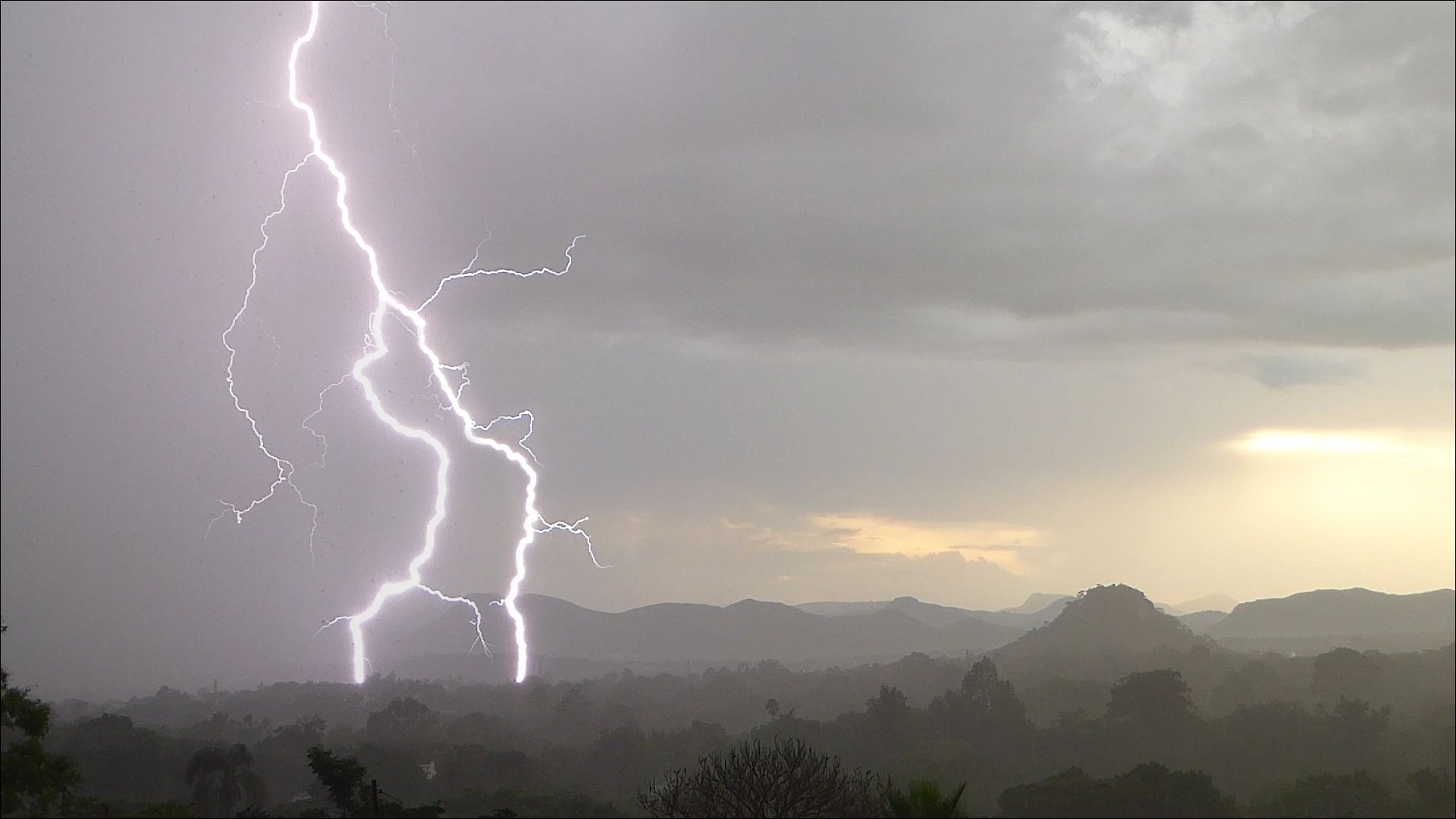 Community photo entitled Best lightning strike in downpour over Mutare by Peter Lowenstein on 12/02/2025 at Mutare, Zimbabwe