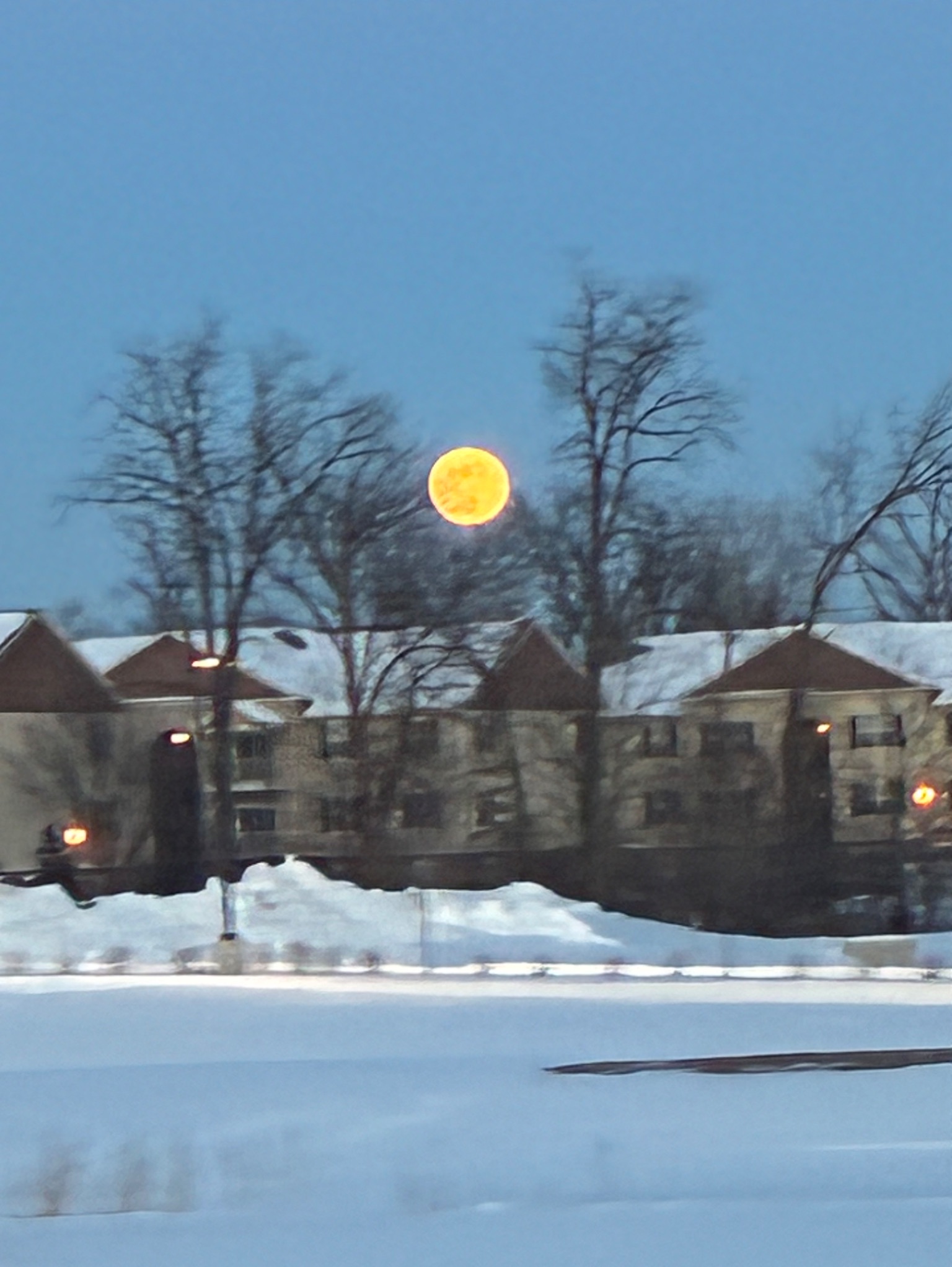 Community photo entitled Snow Moon over snowy Lewis Center by Judy Rich on 02/01/2026 at Lewis Center OH